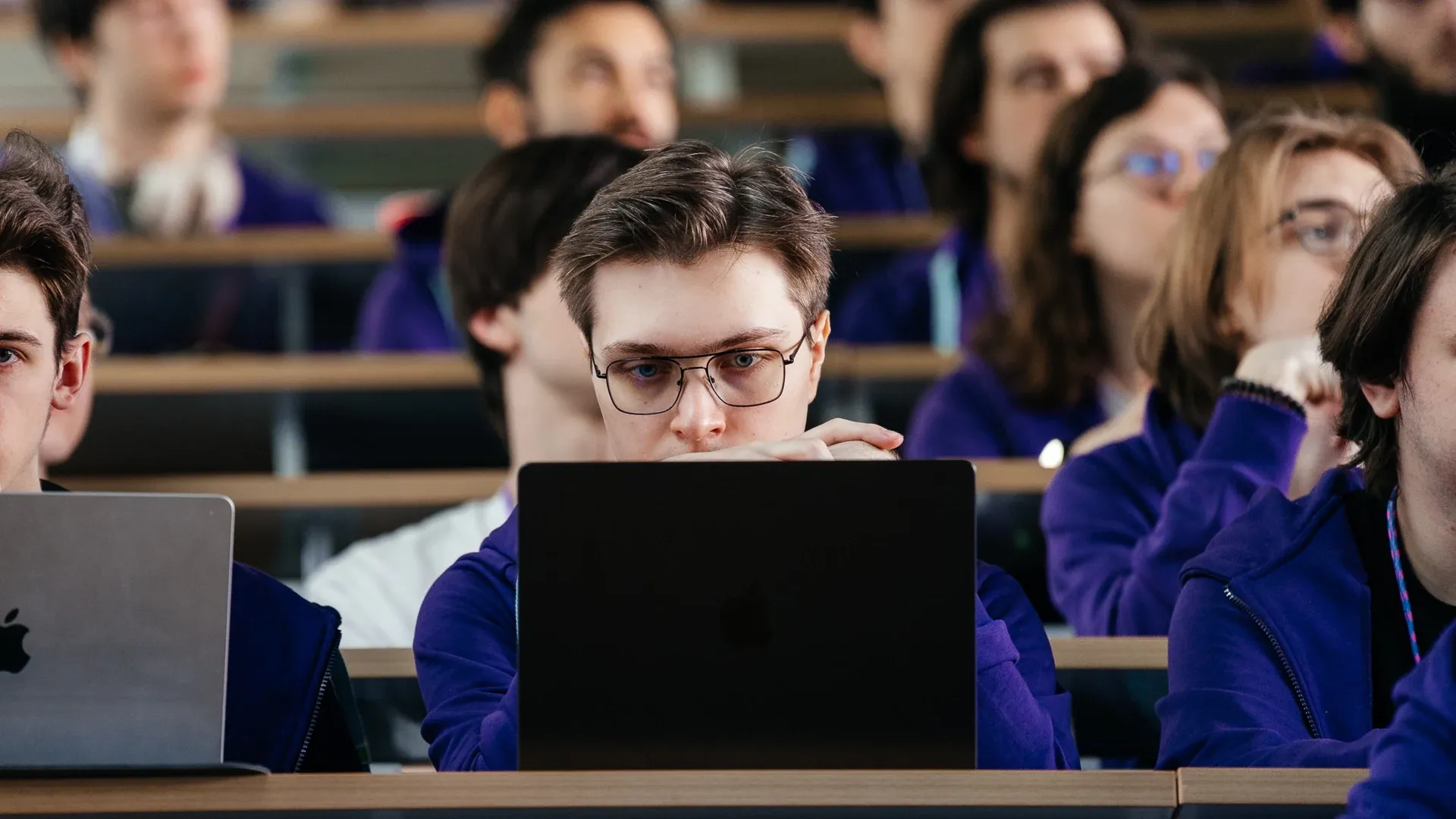 Students working on laptops in an Innopolis University lecture hall